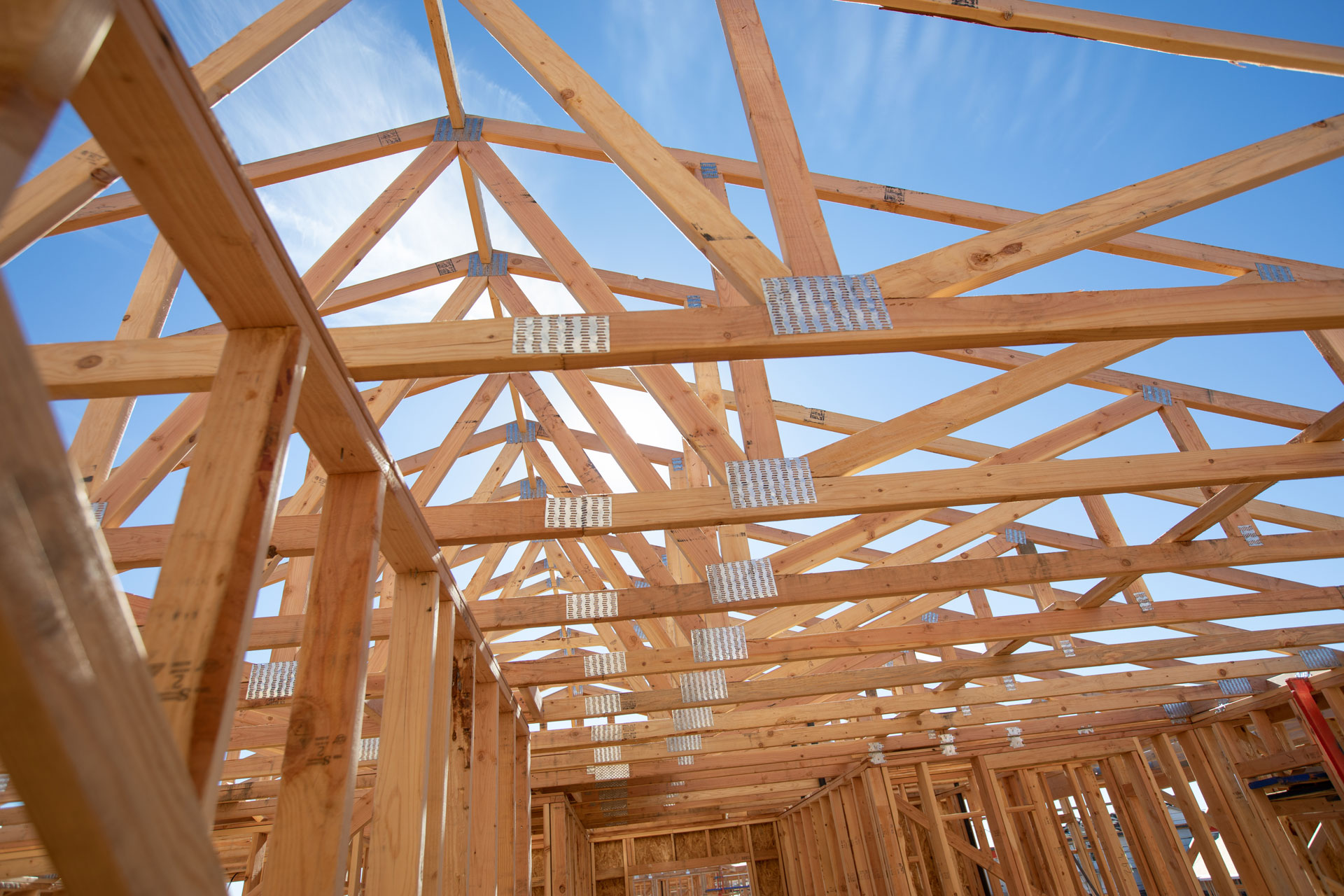 wood-home-framing-abstract-at-construction-site-2024-09-11-16-35-17-utc Roof Truss for Residential Single Family Home Build